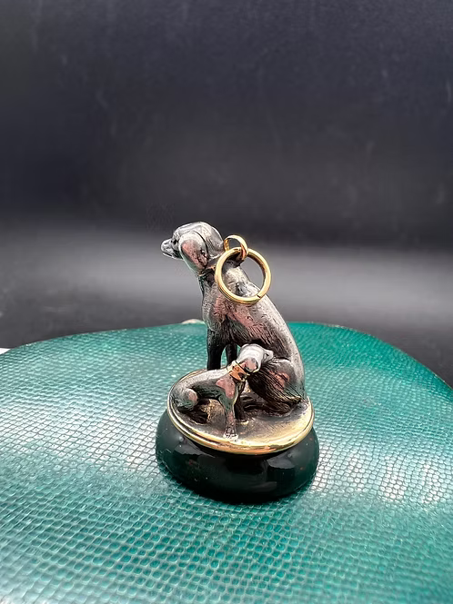 Spaniel and pup fob seal