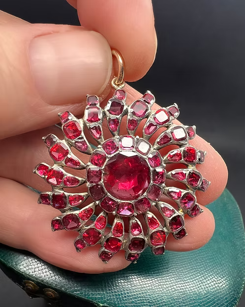 Flat-cut Garnet Sunburst Pendant