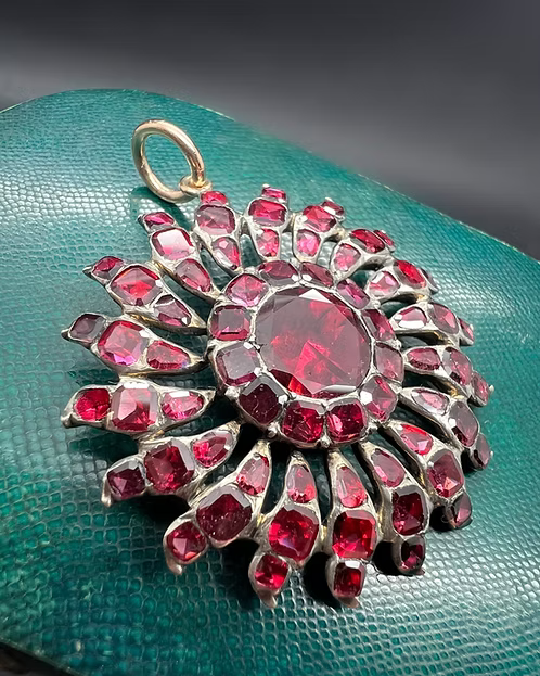 Flat-cut Garnet Sunburst Pendant