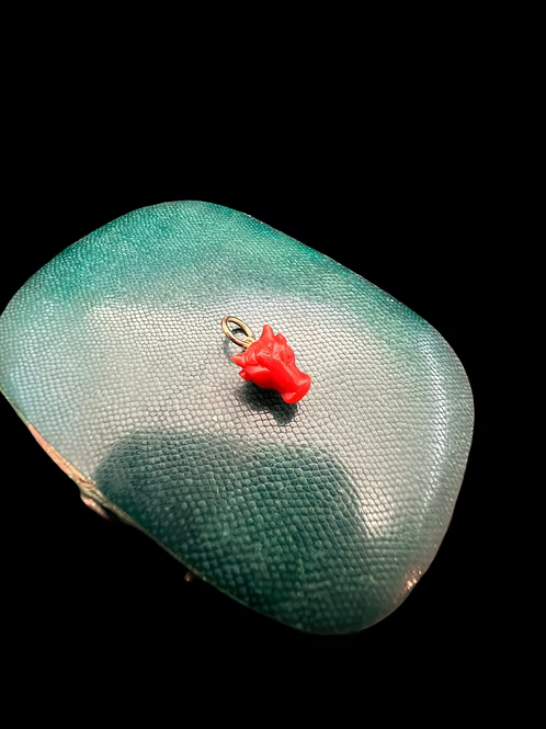 Coral Bull Charm