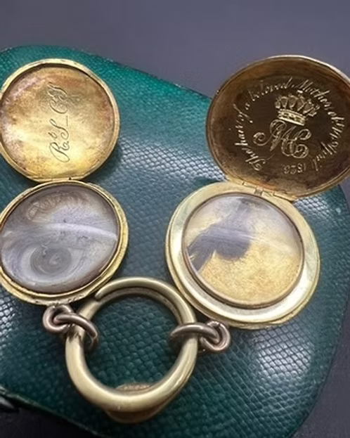 Stopford Family Lockets on a Serpent Split Ring