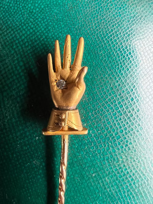 Diamond in a Cuffed Hand
