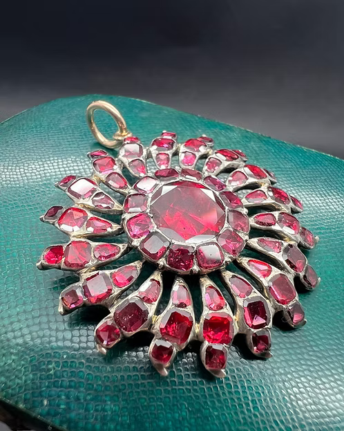 Flat-cut Garnet Sunburst Pendant