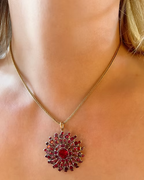 Flat-cut Garnet Sunburst Pendant