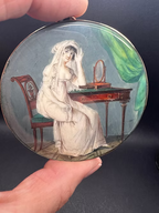 A Lady at her Dressing Table