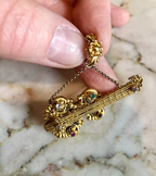Georgian Acrostic Guitar Pendant