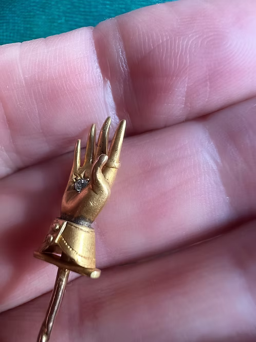 Diamond in a Cuffed Hand