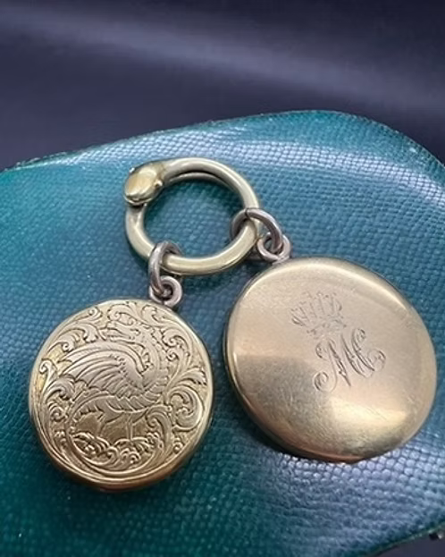 Stopford Family Lockets on a Serpent Split Ring