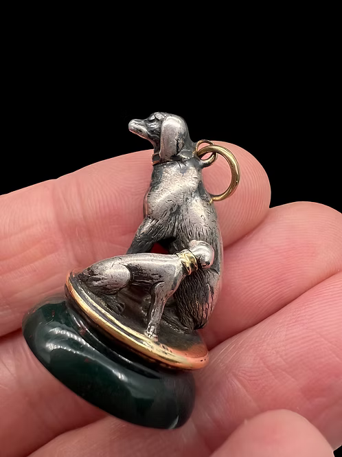 Spaniel and pup fob seal