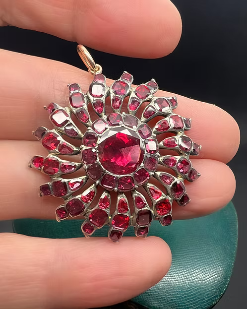Flat-cut Garnet Sunburst Pendant