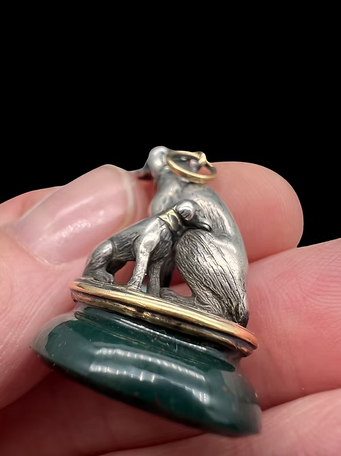 Spaniel and pup fob seal
