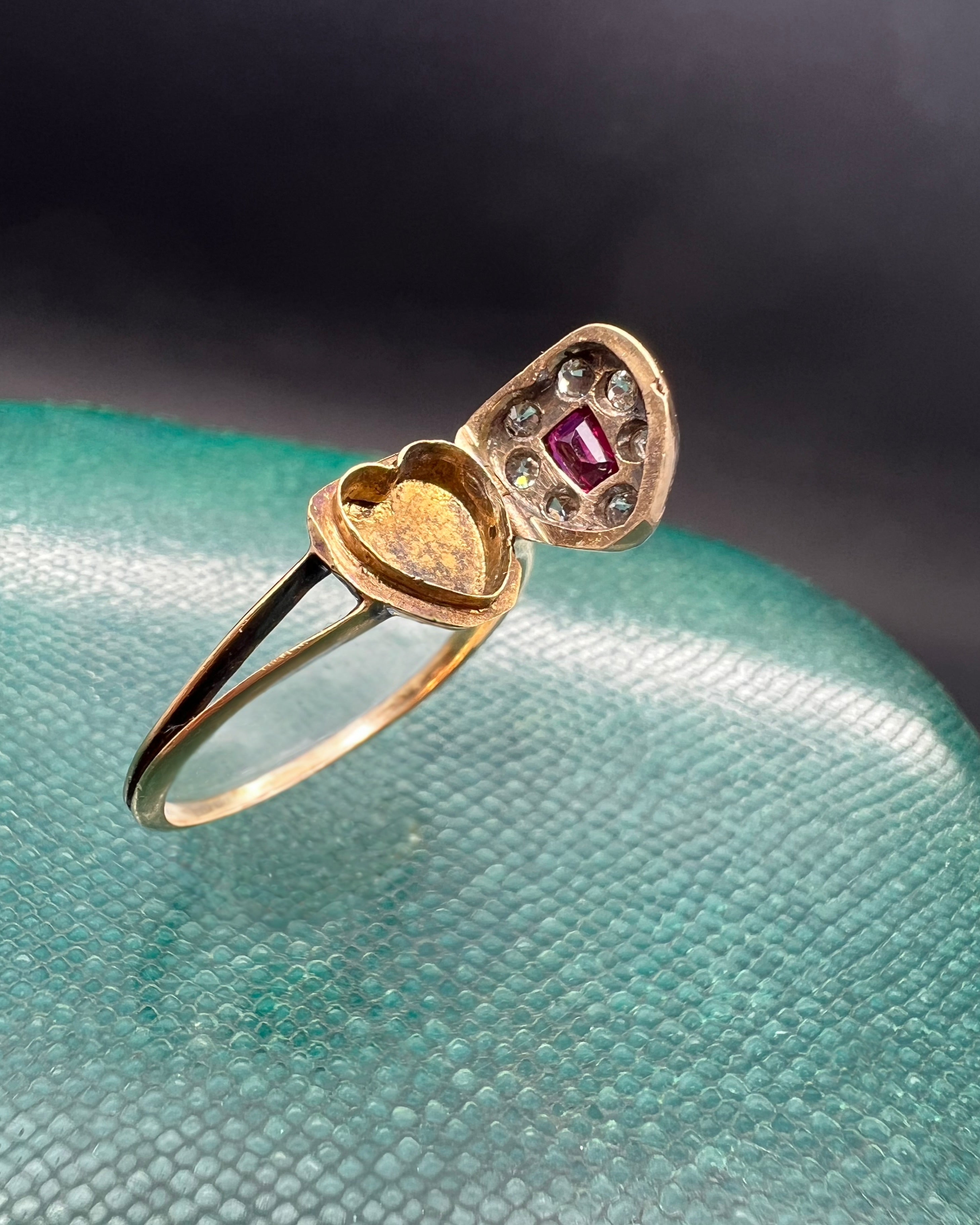 Ruby and diamond locket ring